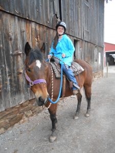 Joanie and her horse Noel